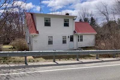 123 West St