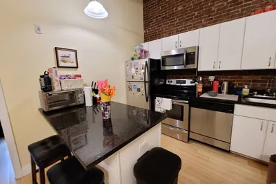 37 Temple Pl. #202