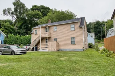 54 Lens St
